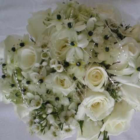 Brompton Floral Designs Wedding Flowers Central London UK NW4 Hand Tied Bunch of white Sweet Peas, Alchemilla, White Bouvardia, and Akito roses 